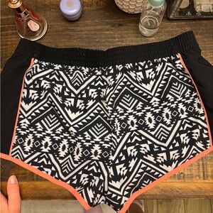 No Boundaries Black and White Geometric Women's Shorts with Orange Trim
